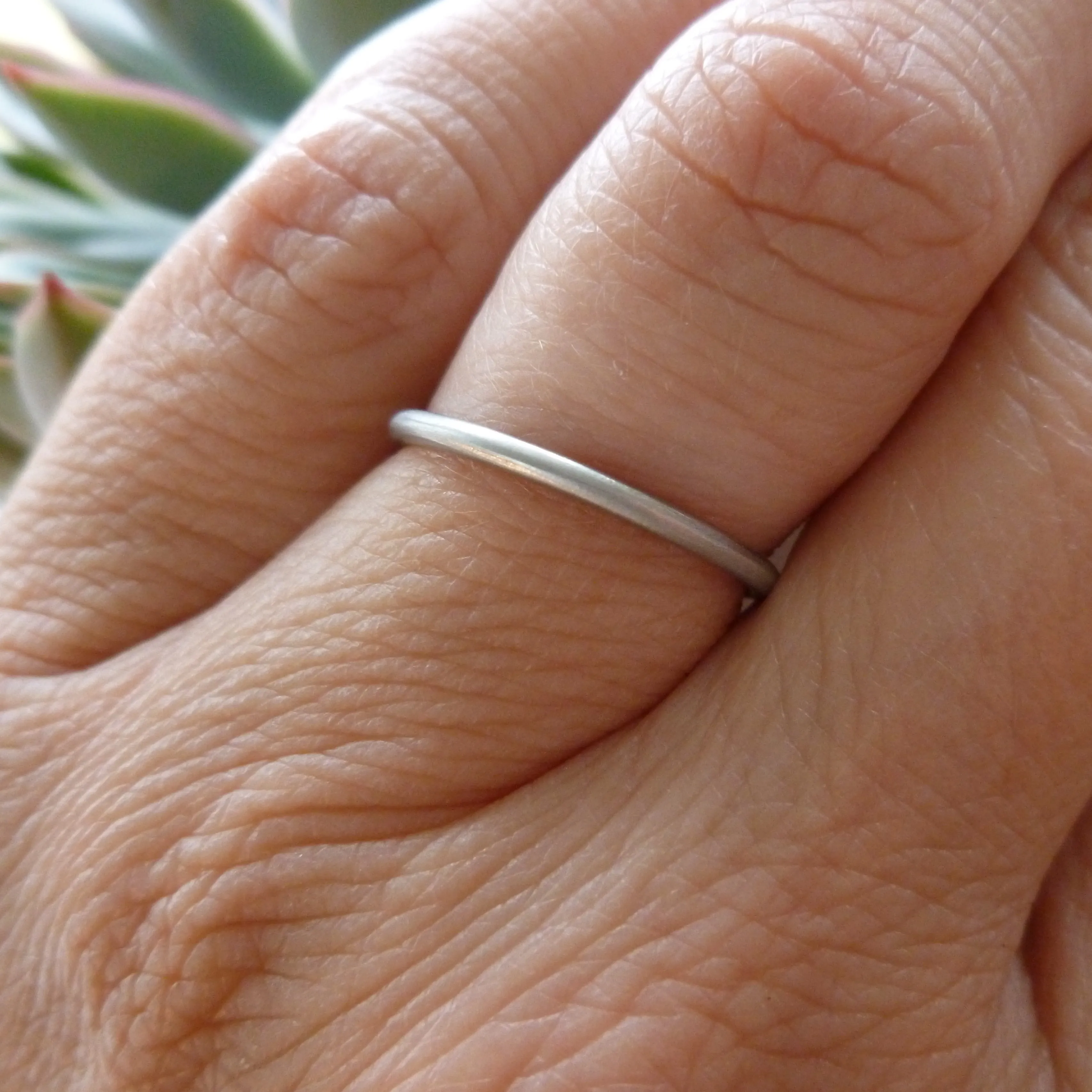 Delicate platinum stacking or wedding ring