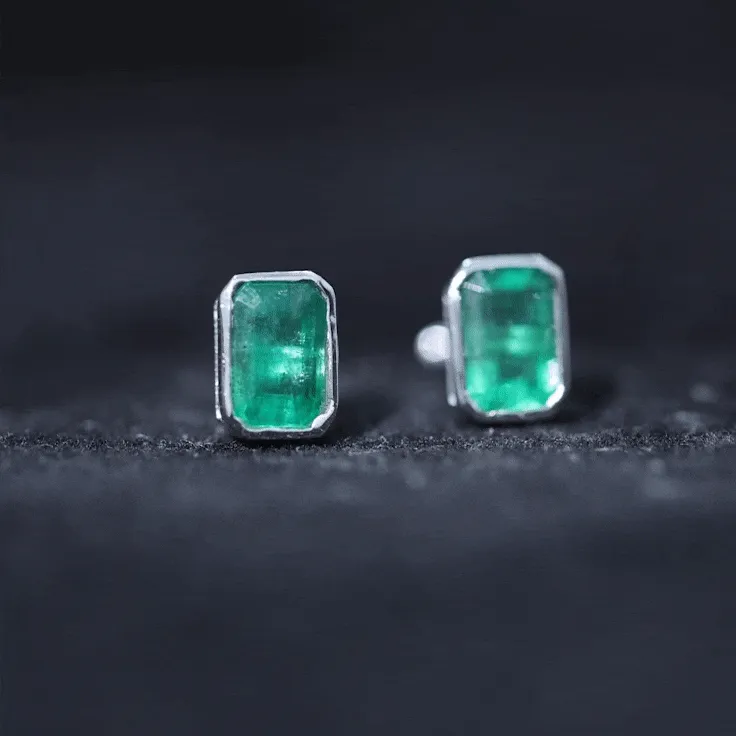 Octagon Cut Emerald Solitaire Stud Earrings in Bezel Setting