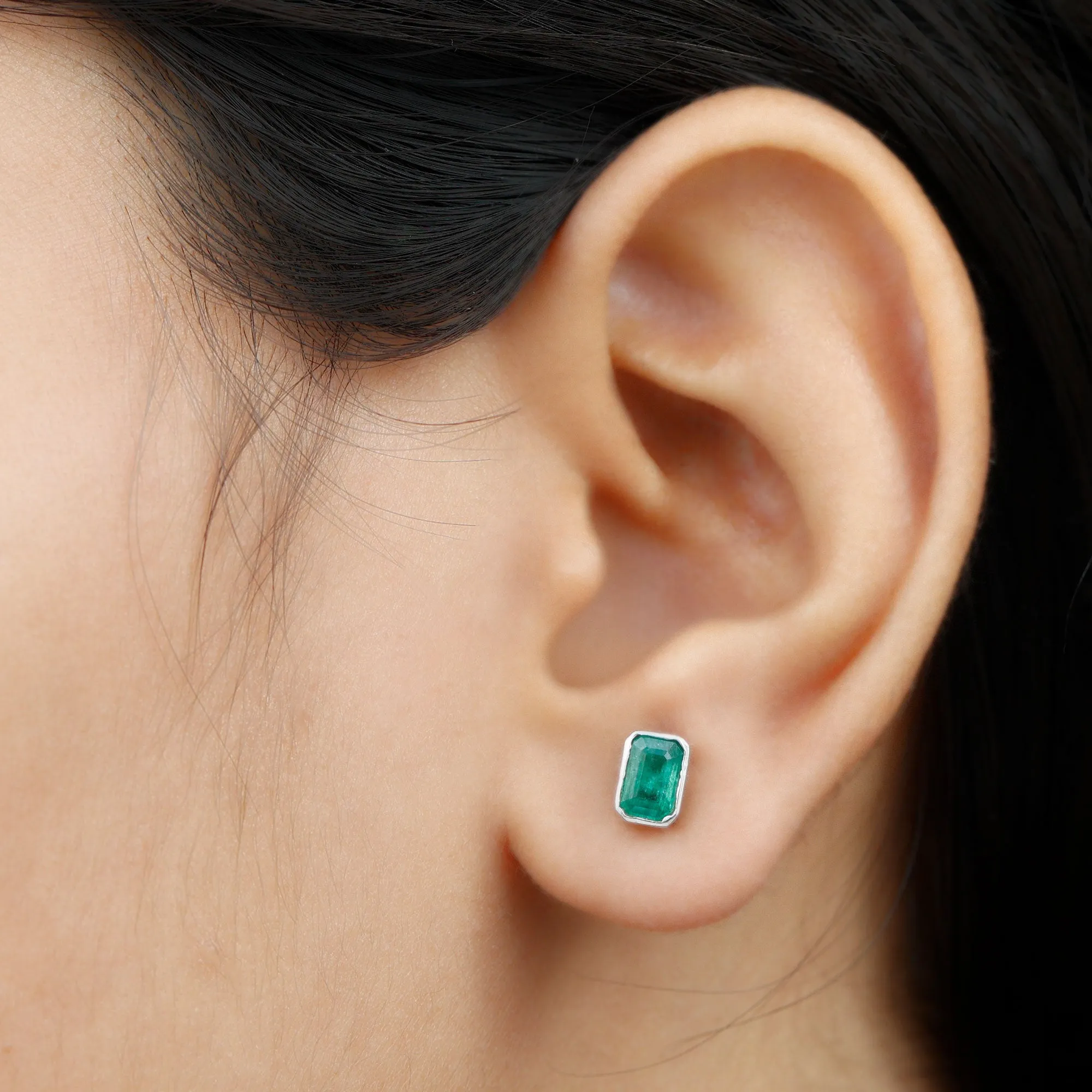 Octagon Cut Emerald Solitaire Stud Earrings in Bezel Setting