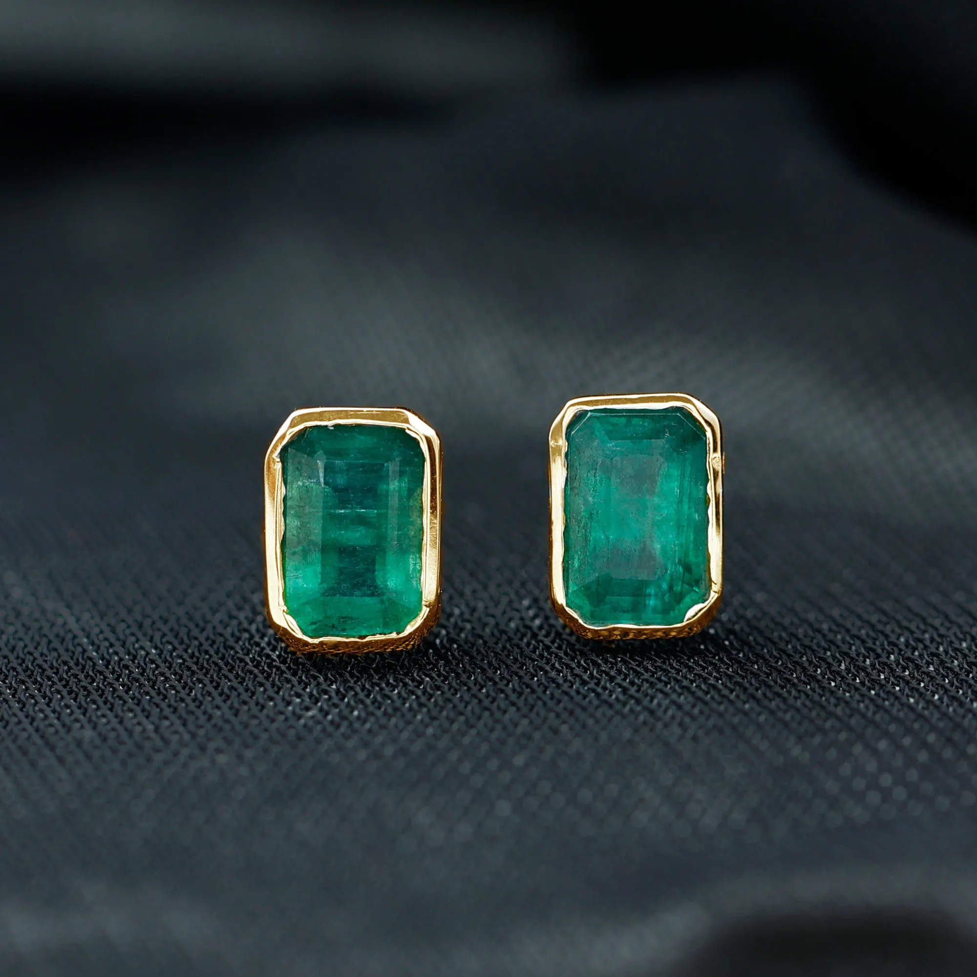 Octagon Cut Emerald Solitaire Stud Earrings in Bezel Setting